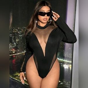 Body suit with mesh cut outs